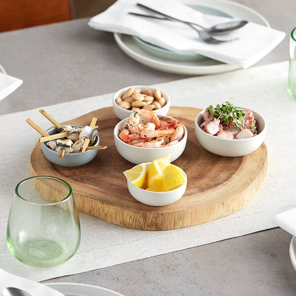 Acopa 12" Round Live Edge Acacia Wood Serving Board – item 303LVE12