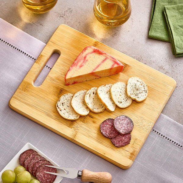 Franmara 11" x 8 5/8" x 5/8" Bamboo Cutting Board w/ Handle – item 2081055