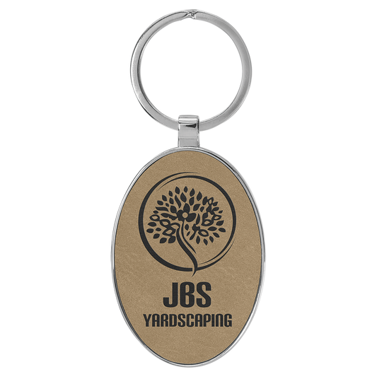 3" x 1.75" Light Brown Metal Oval Leatherette Keychain – item GFT2150