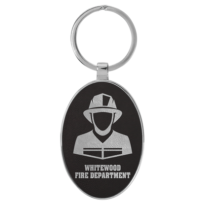 3" x 1.75" Black/Silver Metal Oval Leatherette Keychain – item GFT2156
