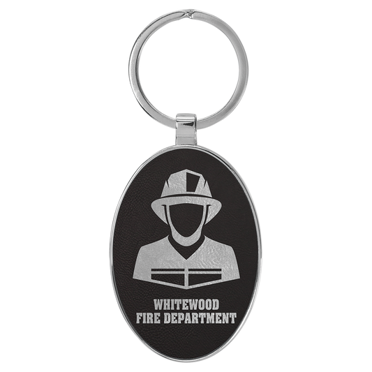 3" x 1.75" Black/Silver Metal Oval Leatherette Keychain – item GFT2156