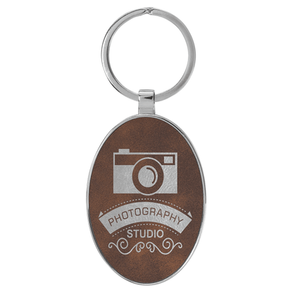 3" x 1.75" Rustic/Silver Metal Oval Leatherette Keychain – item GFT2157 image 3