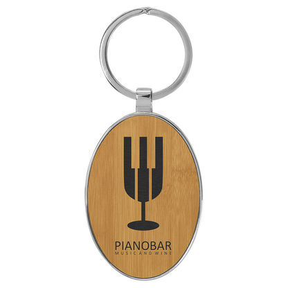 3" x 1.75" Bamboo Metal Oval Leatherette Keychain – item GFT2160