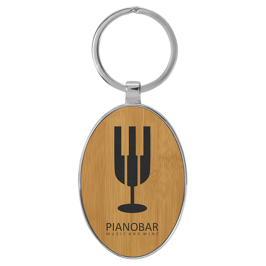 3" x 1.75" Bamboo Metal Oval Leatherette Keychain – item GFT2160