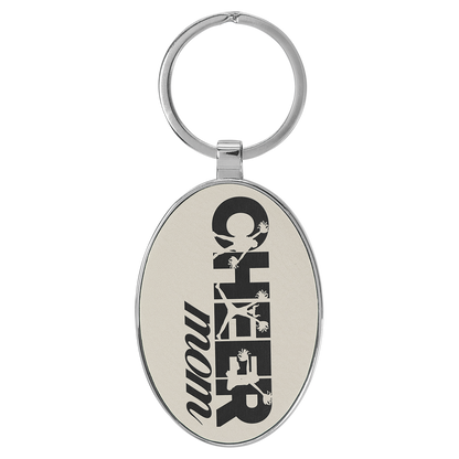 3" x 1.75" White/Black Metal Oval Leatherette Keychain – item GFT2162