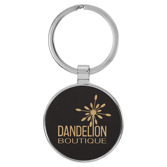 1.5" Black/Gold Metal Round Leatherette Keychain – item GFT2192