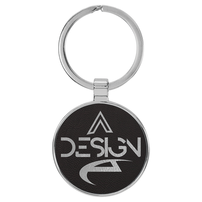 1.5" Black/Silver Metal Round Leatherette Keychain – item GFT2196