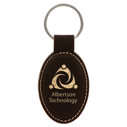 3" x 1.75" /Gold Oval Leatherette Keychain – item GFT241A