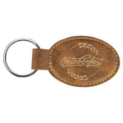 3" x 1.75" /Gold Oval Leatherette Keychain – item GFT701