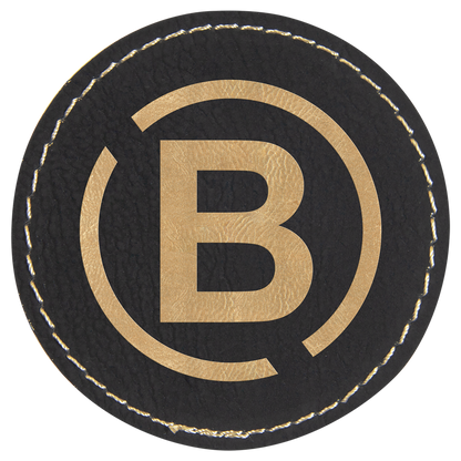 2.5" x 2.5" Black/Gold Round Leatherette Patch with Adhesive – item PTH306